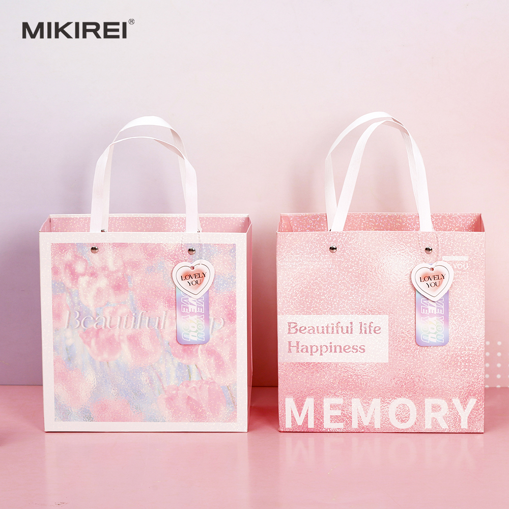 High-end custom printed white card paper gift shopping bags - Unique design ribbon handle gilding process