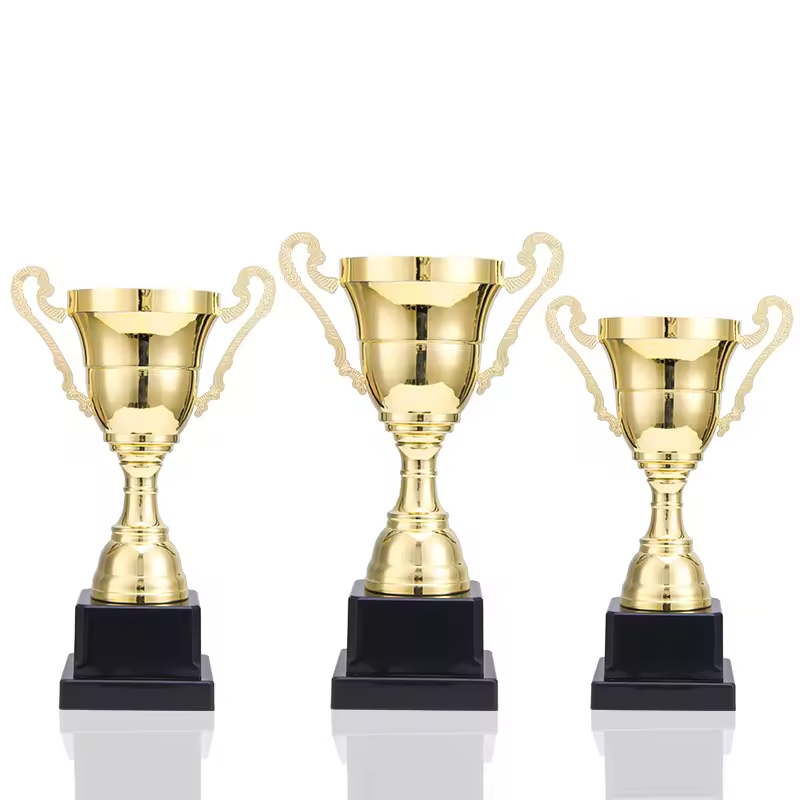 Factory price custom trophy - a commemorative metal trophy for sports event awards with black and red ribbons and a golden body